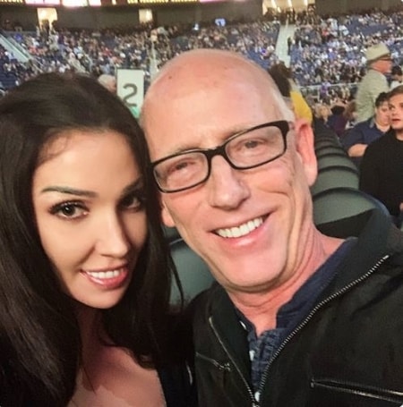 Kristina Basham and Scott Adams enjoying a sporting event